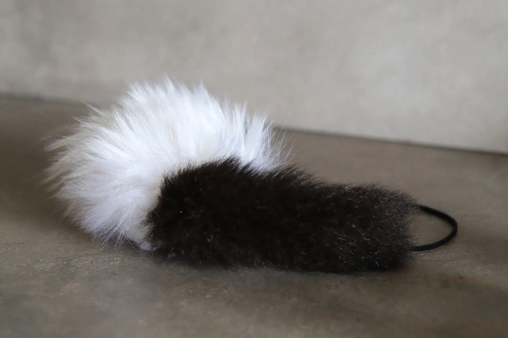 Hollow Hopper Sheepskin with a NZ Possum Tail