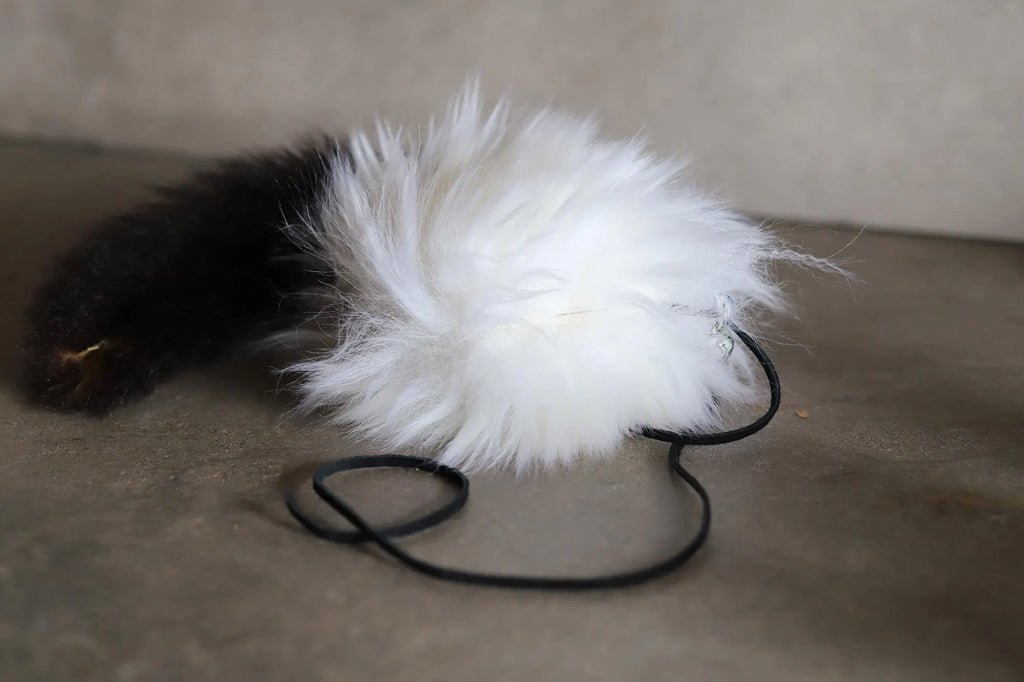 Hollow Hopper Sheepskin with a NZ Possum Tail