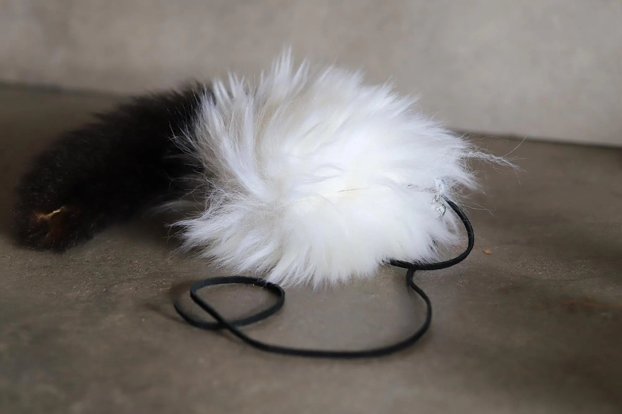 Hollow Hopper Sheepskin with a NZ Possum Tail