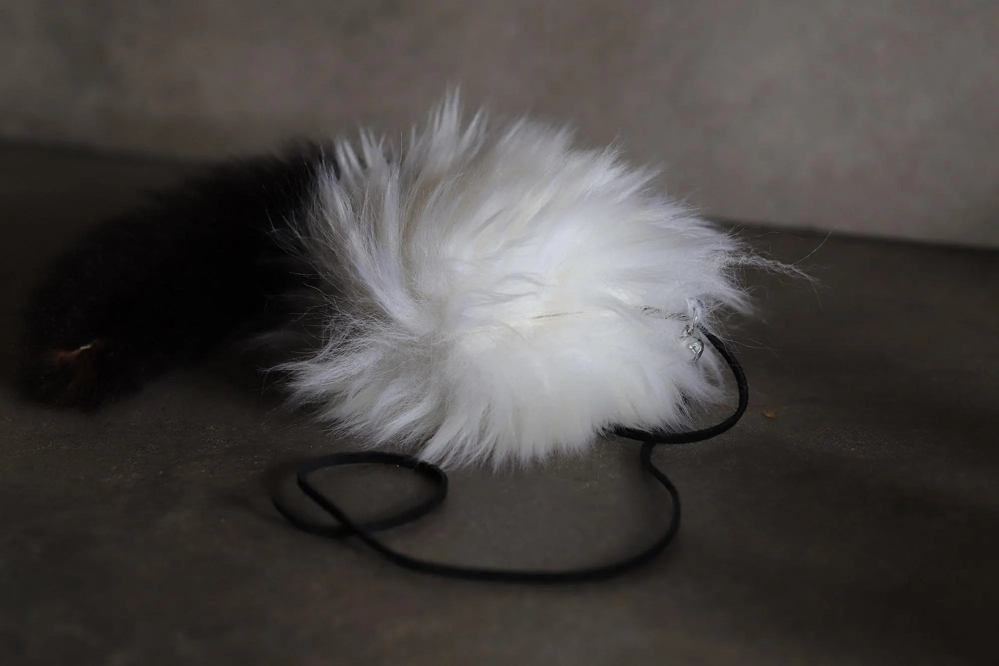 Hollow Hopper Sheepskin with a NZ Possum Tail