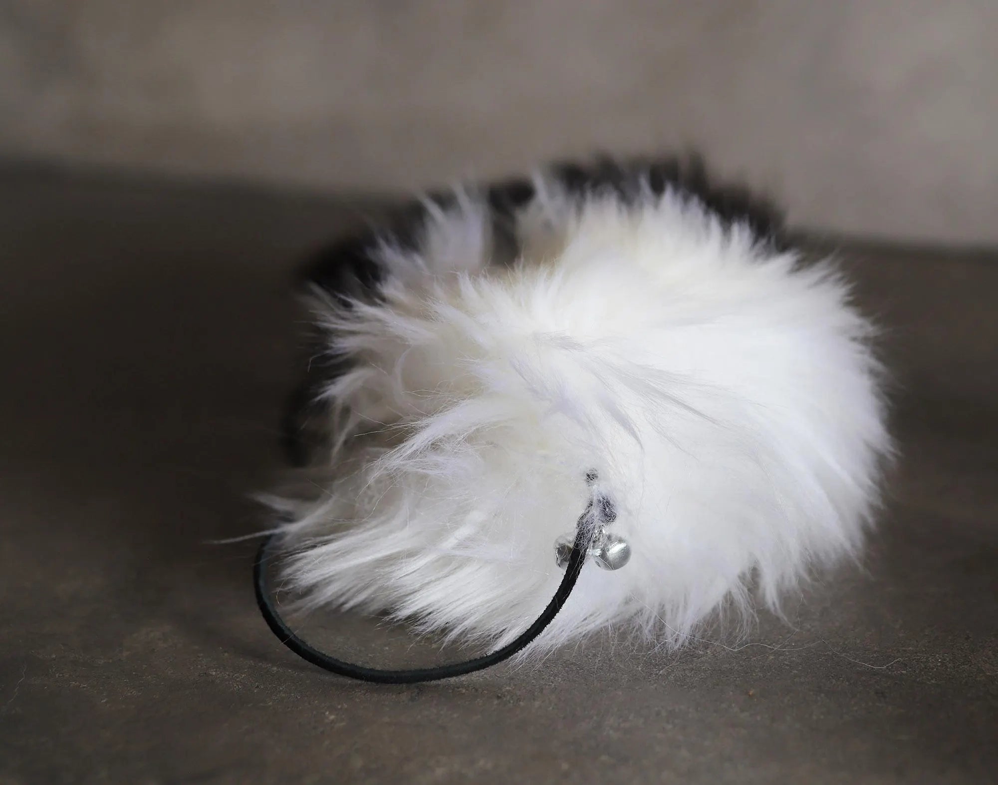Hollow Hopper Sheepskin with a NZ Possum Tail
